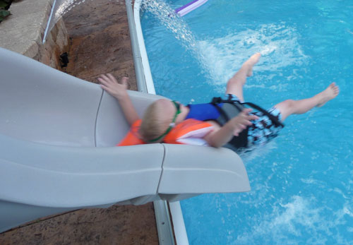 boy on water slide