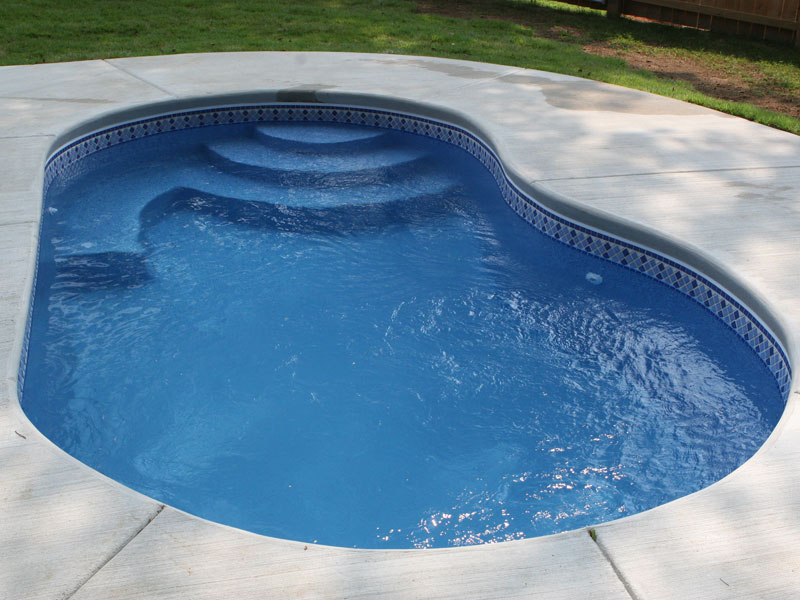 Kidney shaped fiberglass pool Maui