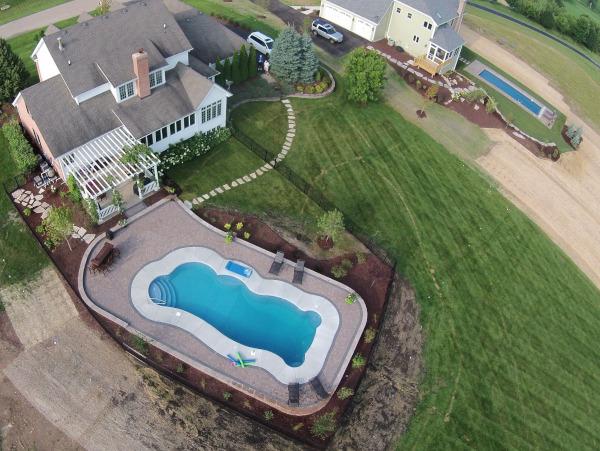 fiberglass Pool with stairs before landscaping