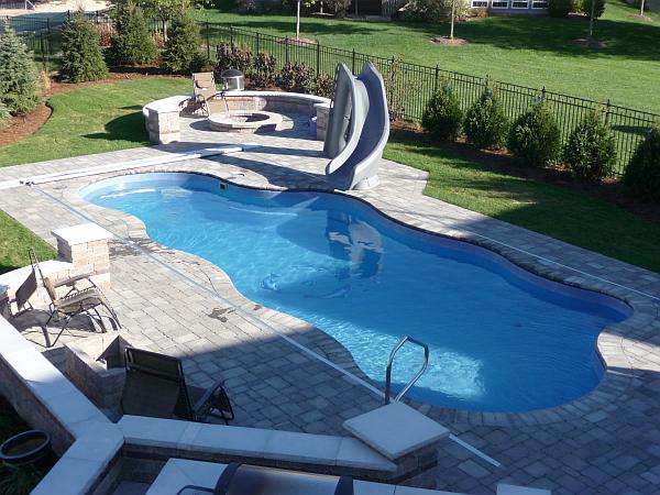 pool with patio firepit