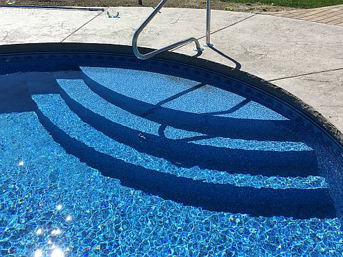 Pool with rounded steps by Swim Shack